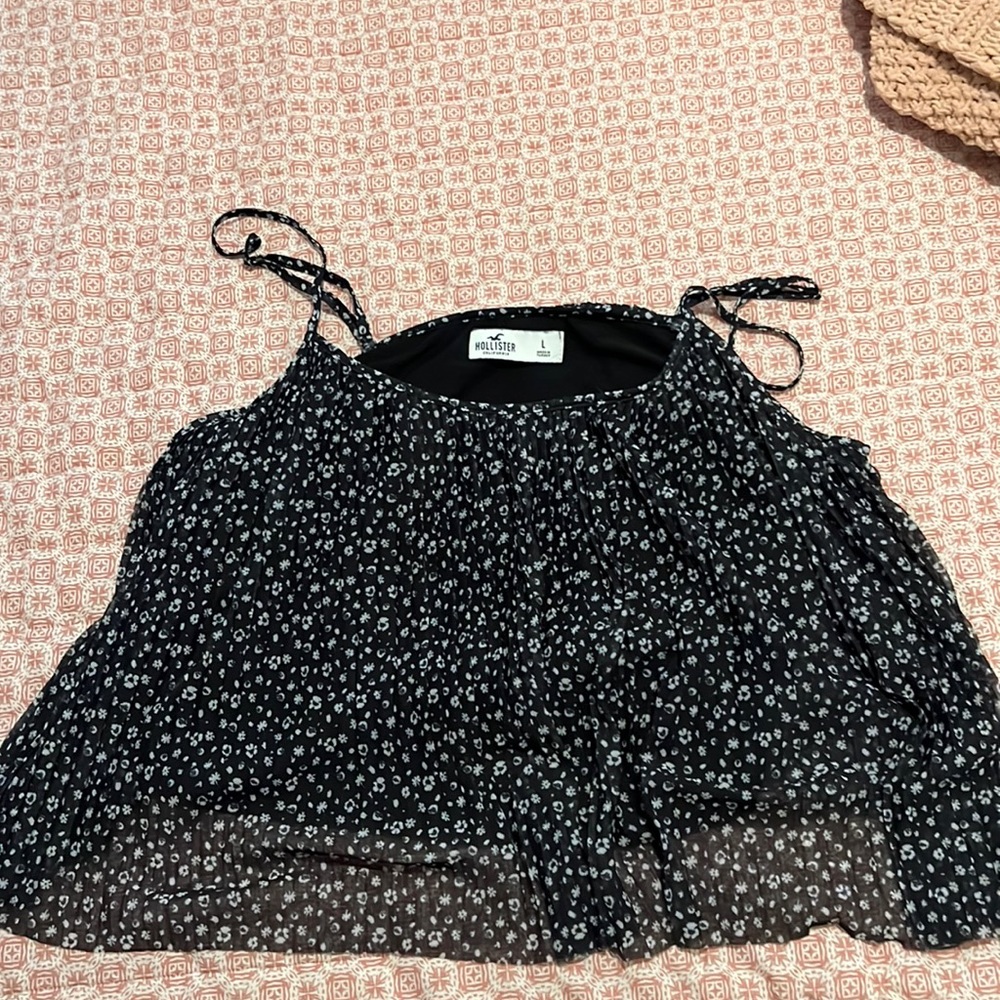 Black Hollister tank top with flowers